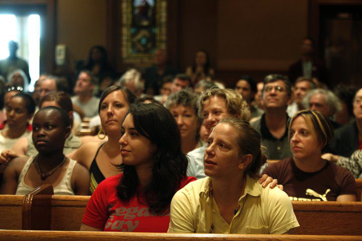 A crowd of people in a church.