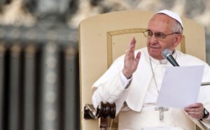 Pope francis gives a speech at the vatican.