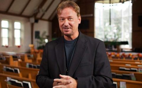Pastor speaking inside an empty church