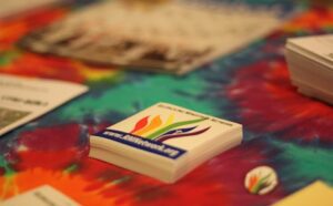 A table full of papers and stickers on a table.