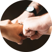 People bumping fists